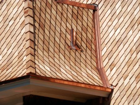Fancy shingle designs can create a striking look for your home.